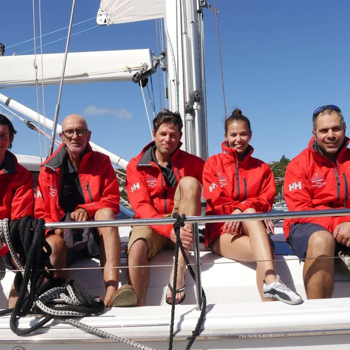 Flying Fish sailors gathered aboard a training yacht